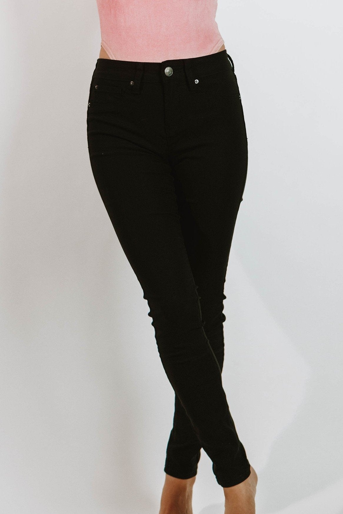 Black Hyperstretch Mid Rise Skinny Jeans